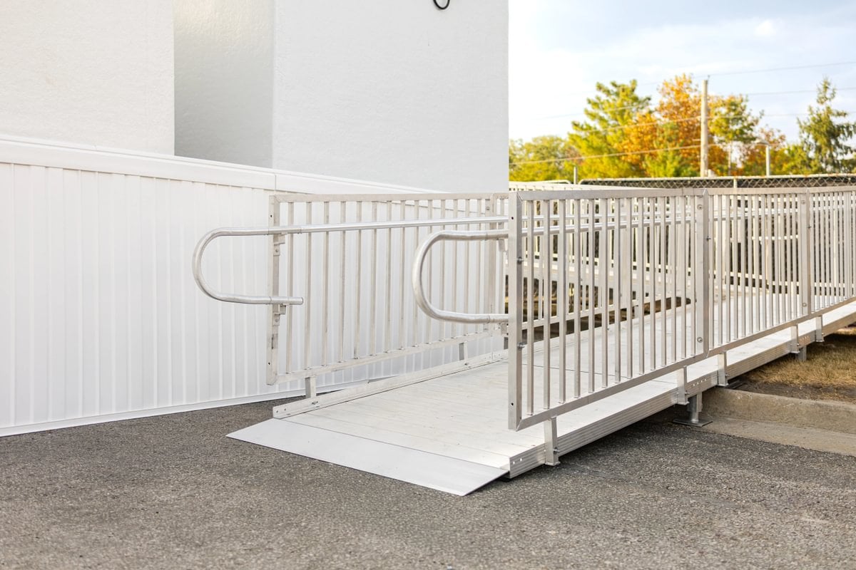 Professionally installed aluminum wheelchair ramp at a residential home